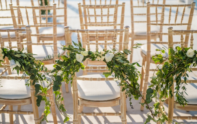 Elite-Events-Santorini-greenery-chairs-wedding-ceremony